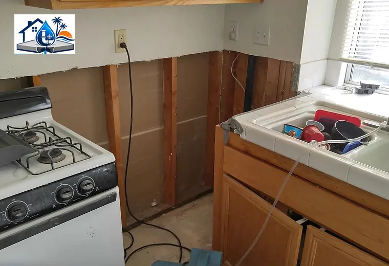 Burst pipe repair and general plumbing access in kitchen wall